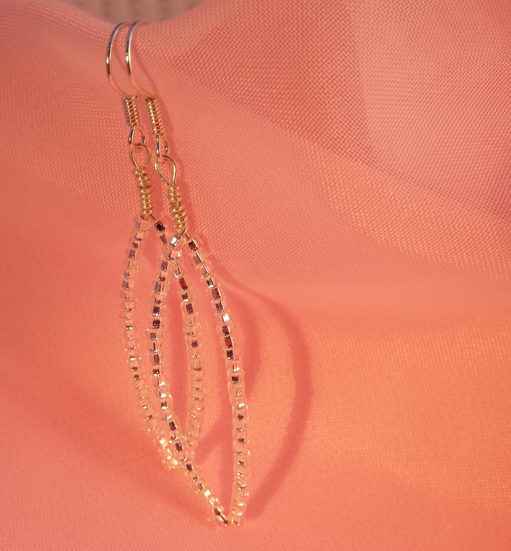 wire wrapped earrings with silver lined seed beads on silver plated wire and fish hook earwires