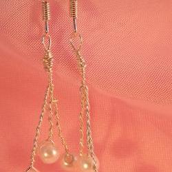 Glass pearl earrings on silver plated wire hung on silver plated earwire